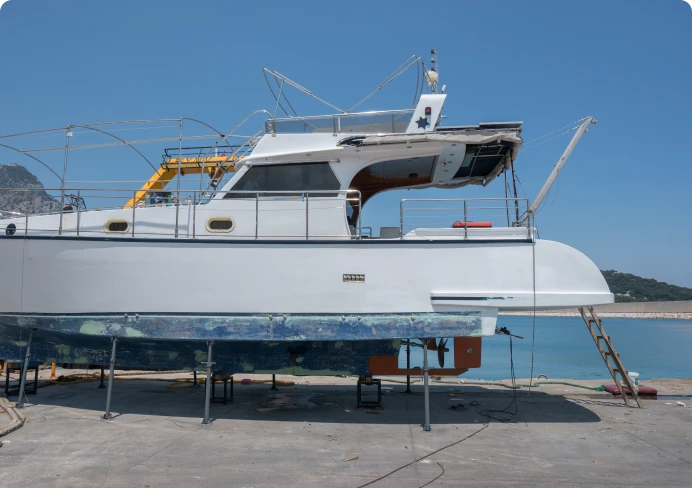 Yacht on shore for repairs